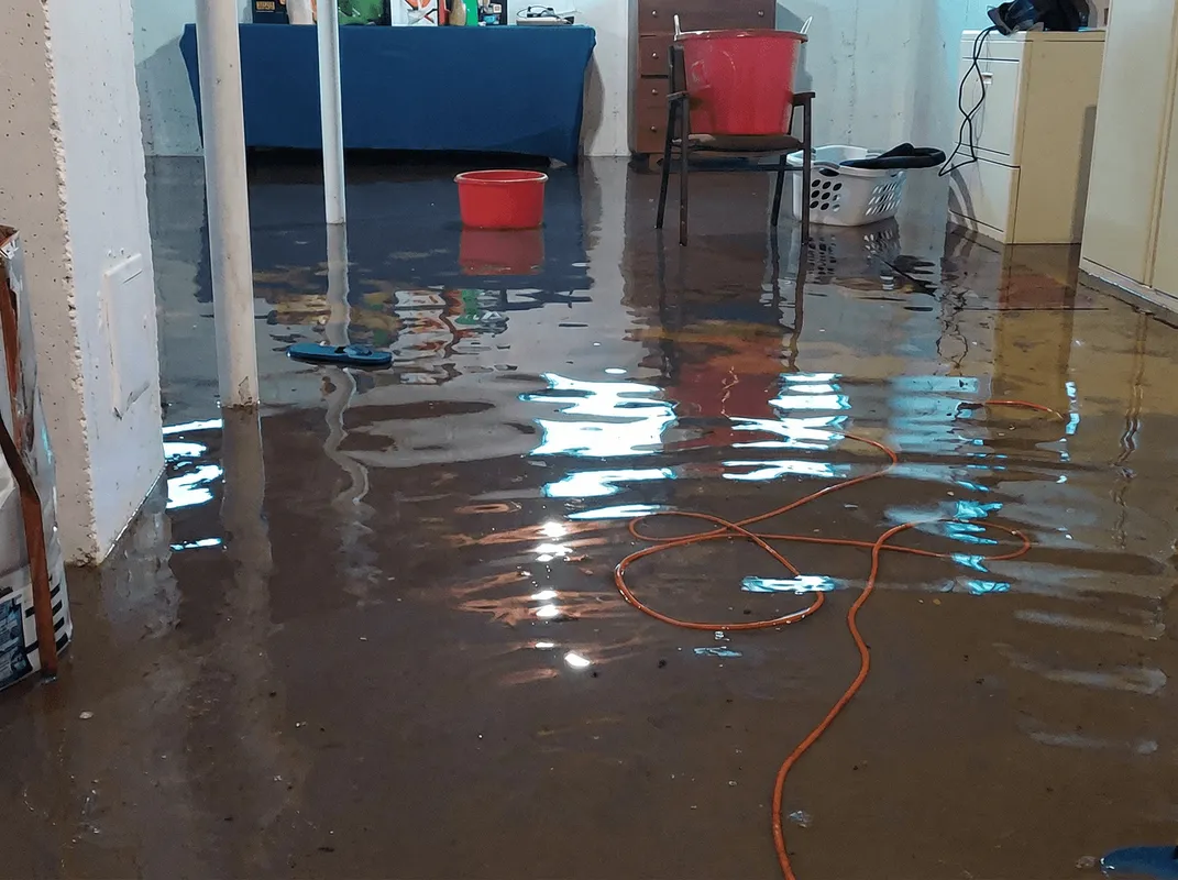 Basement with boiler, cabinets and washing machine completely flooded in Buffalo, NY